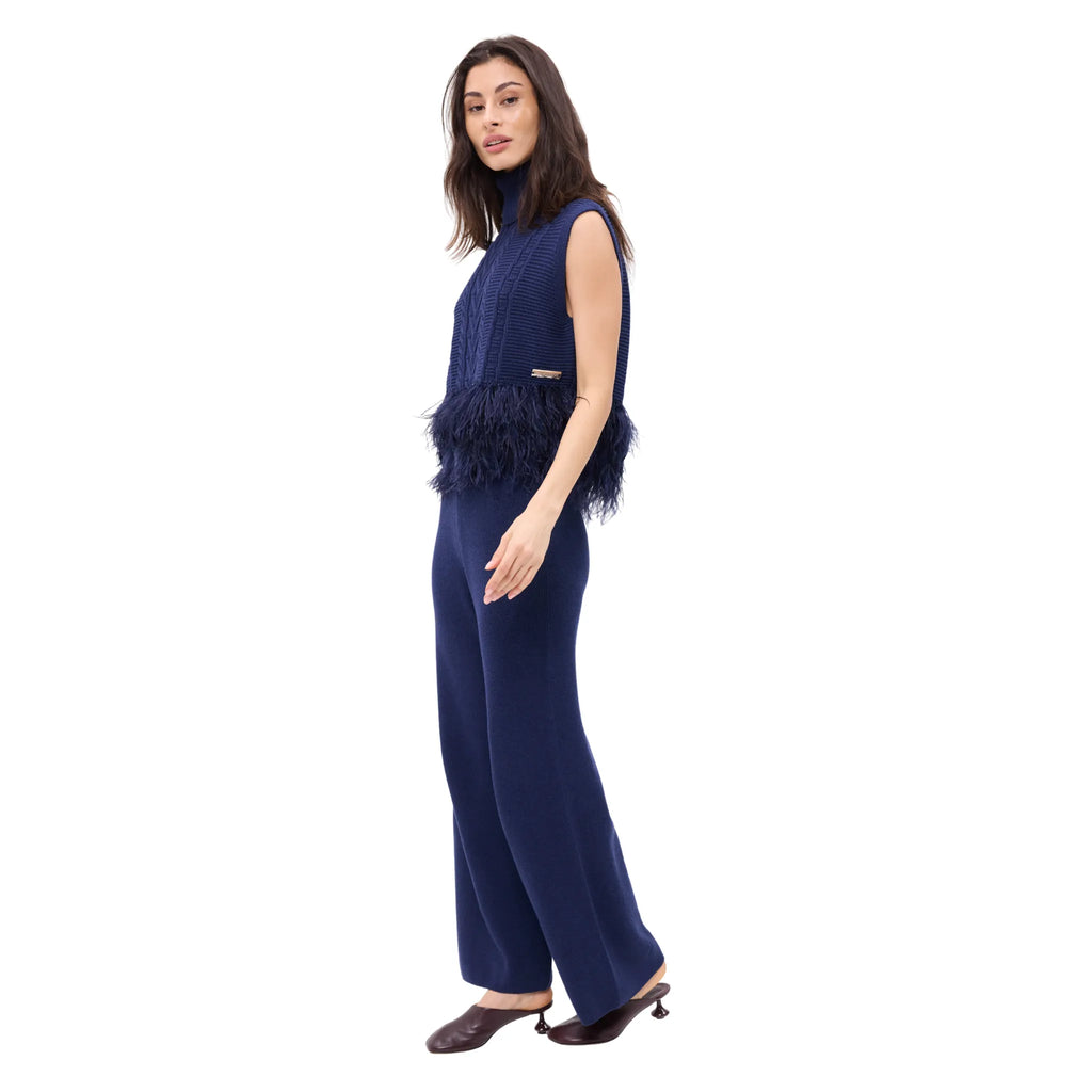 The Sleeveless Polo Neck With Feather Trim