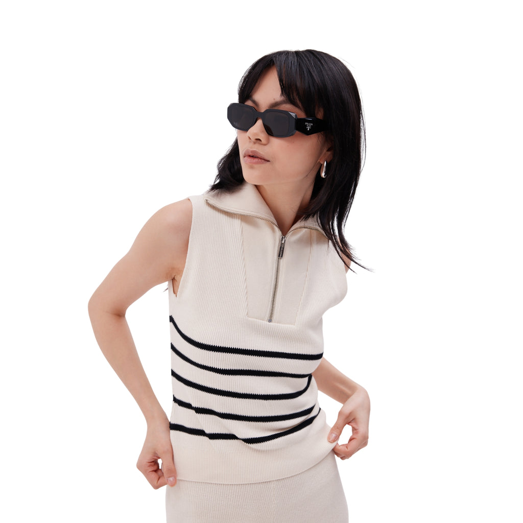 The Sleeveless Striped Zip Up Sweater in Meringue & Black