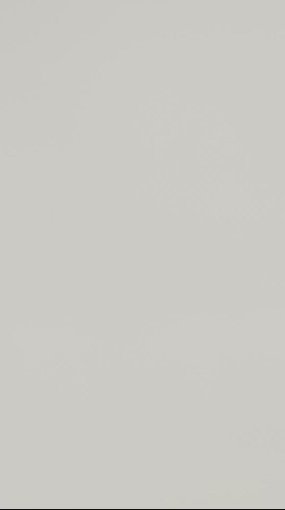 The Sleeveless Striped Zip Up Sweater in Meringue & Black